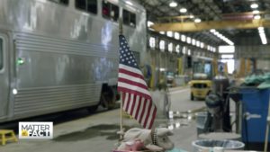 American flag against backdrop of a garage