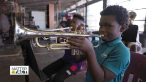 Young Florida boy playing trumpet