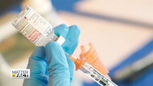 covid vaccine and syringe